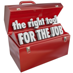 The Right Tool for the Job words in a red metal toolbox to illus
